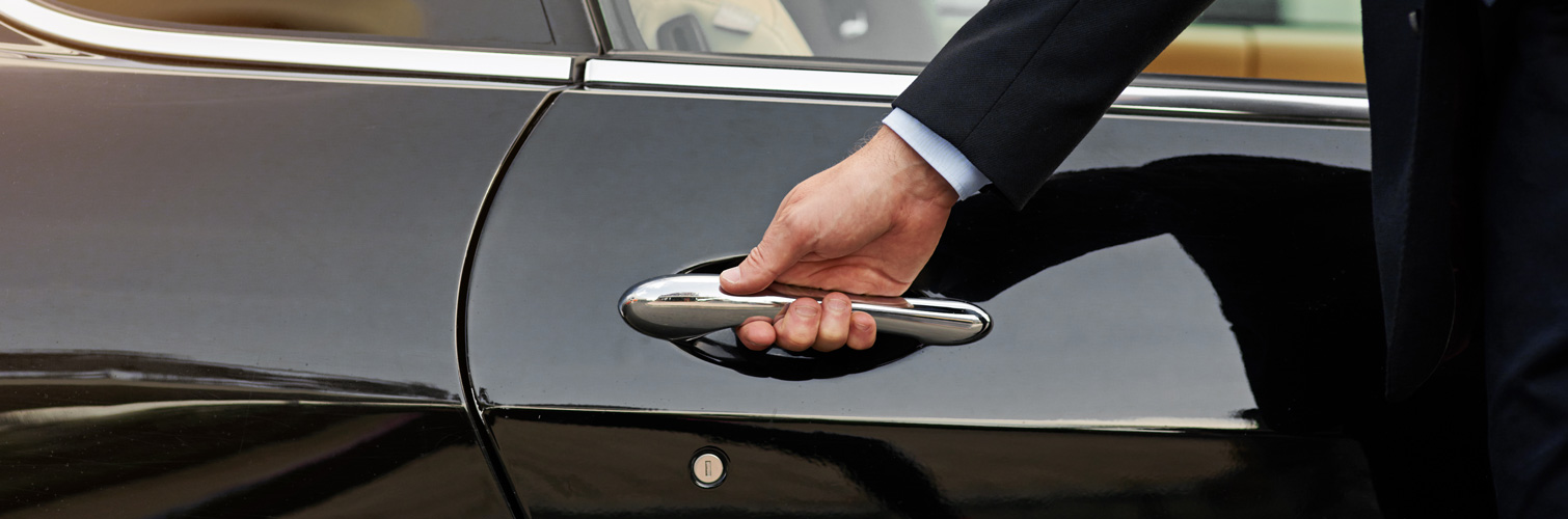 man opening car door handle
