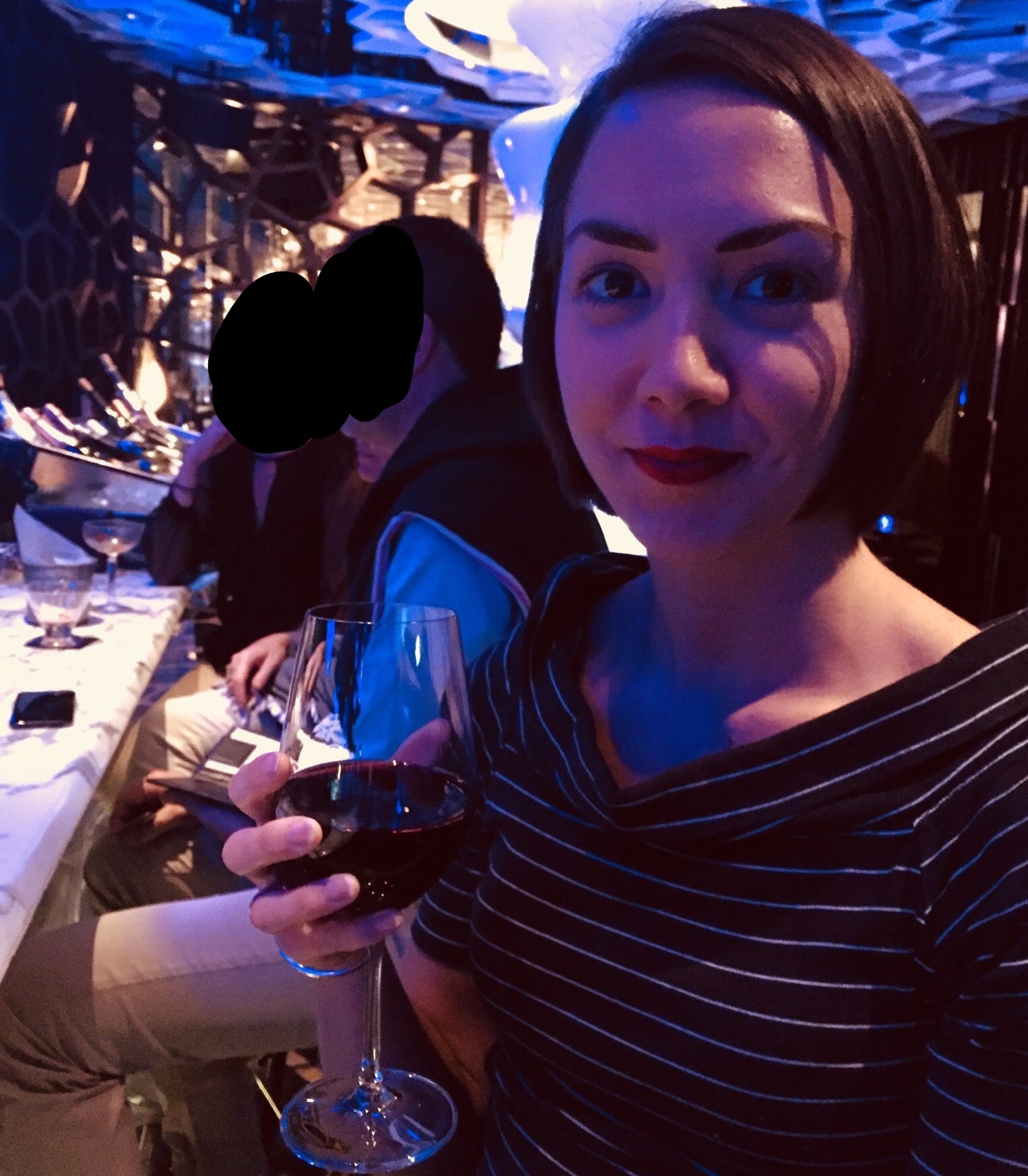 Me in a bar, drinking red wine, about 2 months before getting sober.