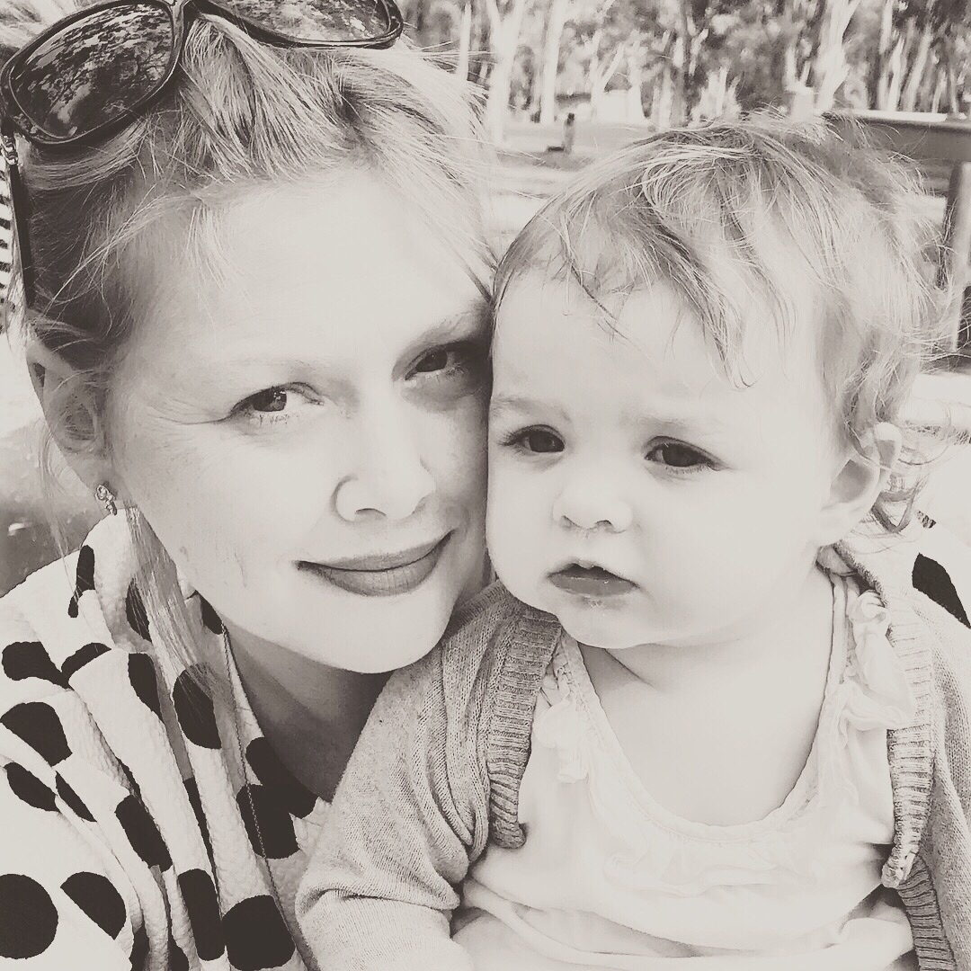 Naomi Lambert, pictured with a baby.