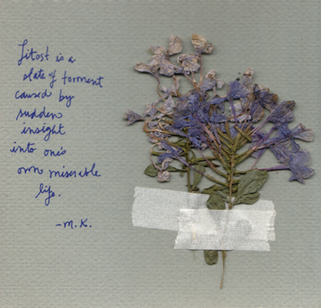 page from an old journal with a pressed flower and Milan Kundera quote