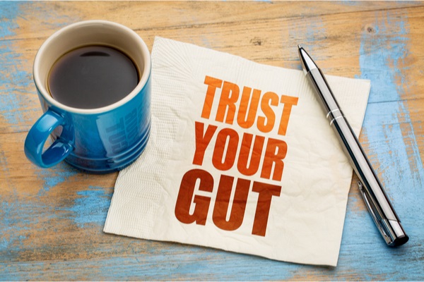 trust your gut words on a paper