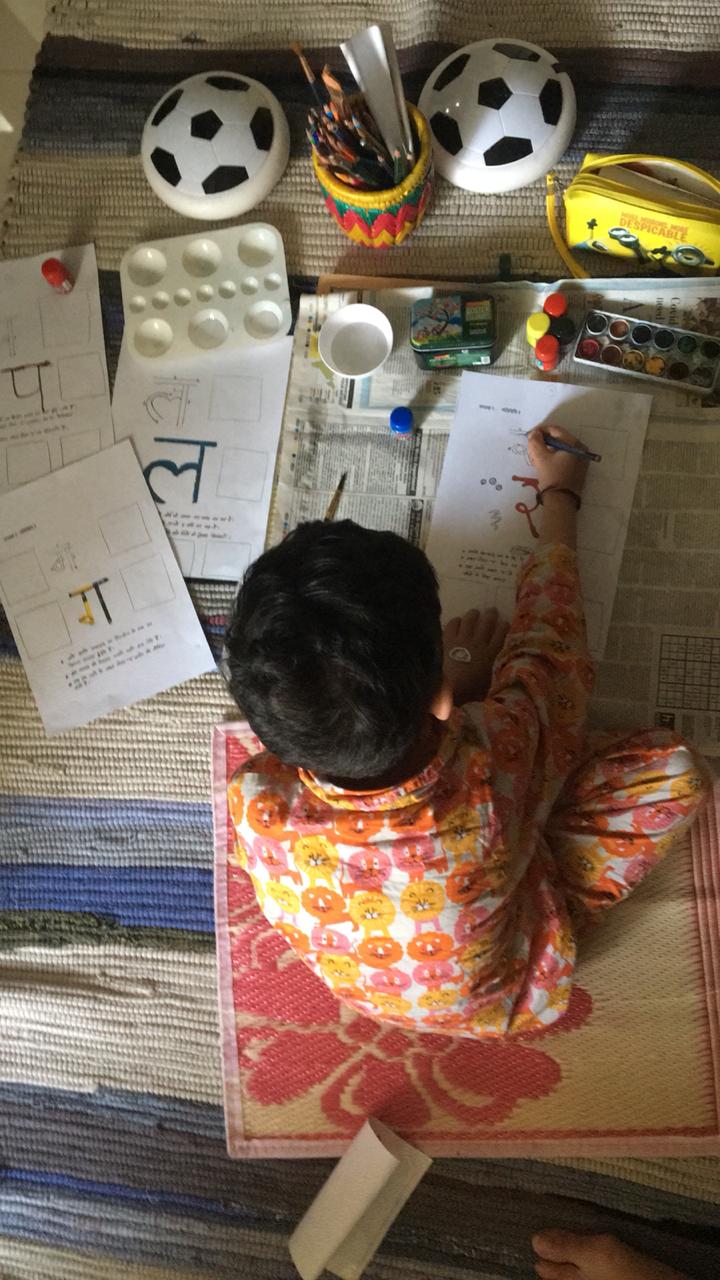 Life skill to teach your kid - child writing creatively