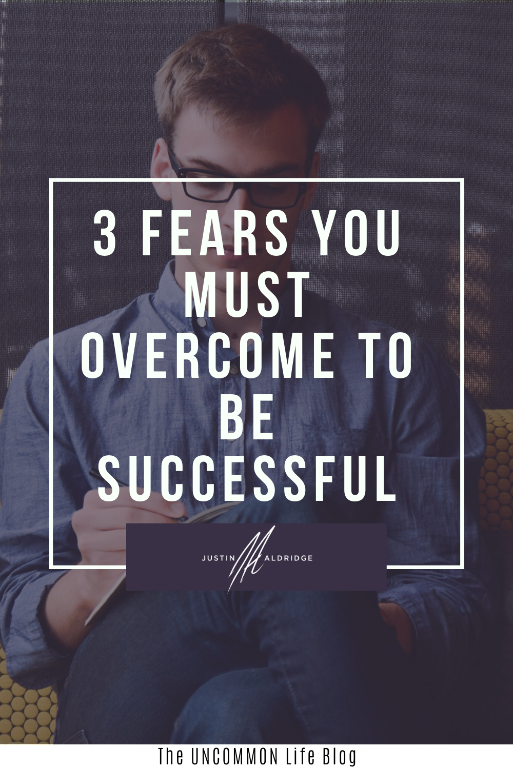 Man in sitting on a couch writing in the background behind the text, “3 fears you MUST overcome to be successful” in white font