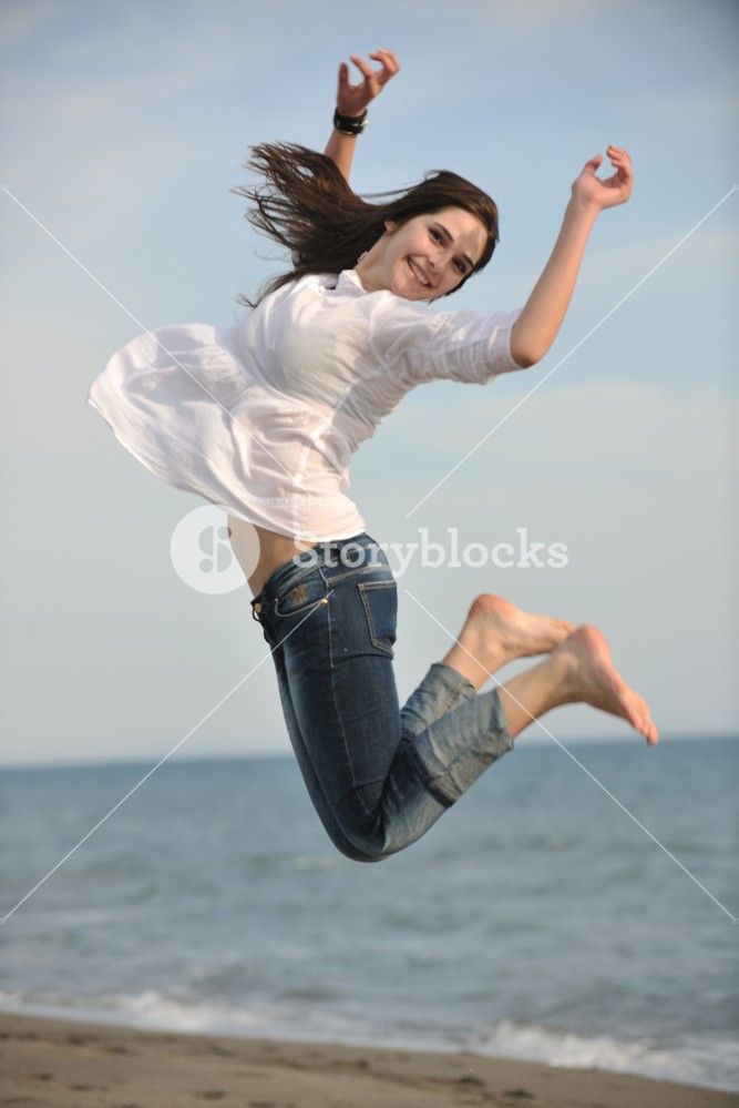 Lady jumping for joy at the introvert wow moment