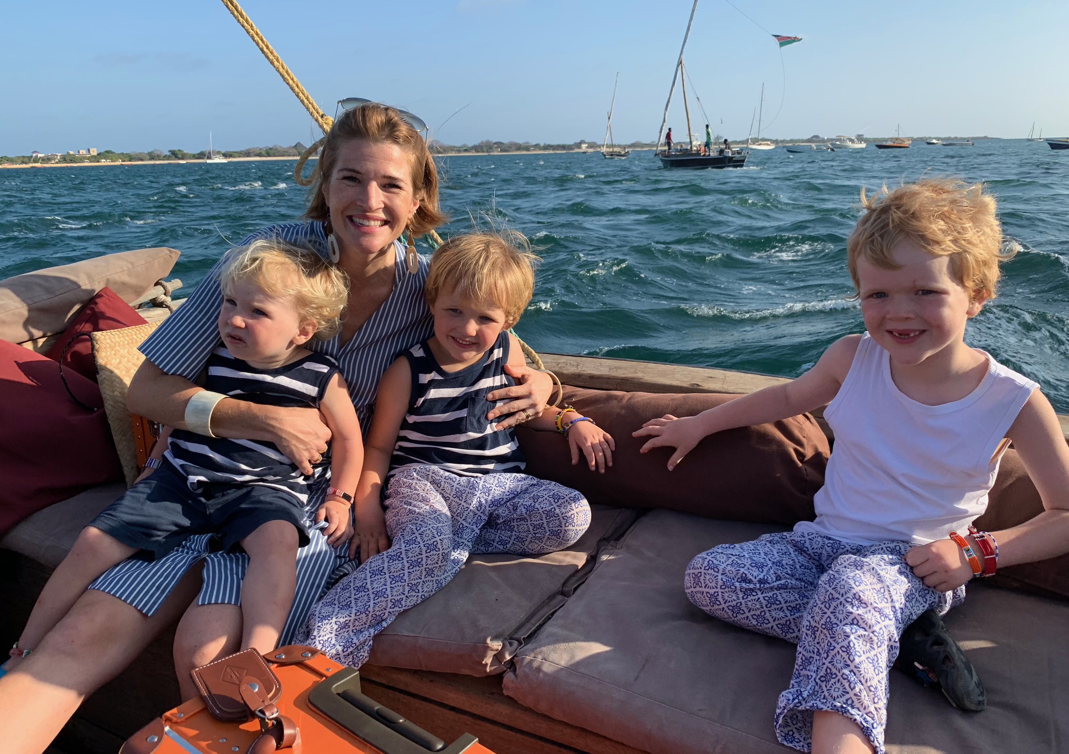 Sara Banks with three of her four sons off the coast of Lamu, Kenya, in 2019.