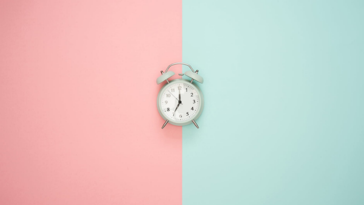 Clock on pink and blue background