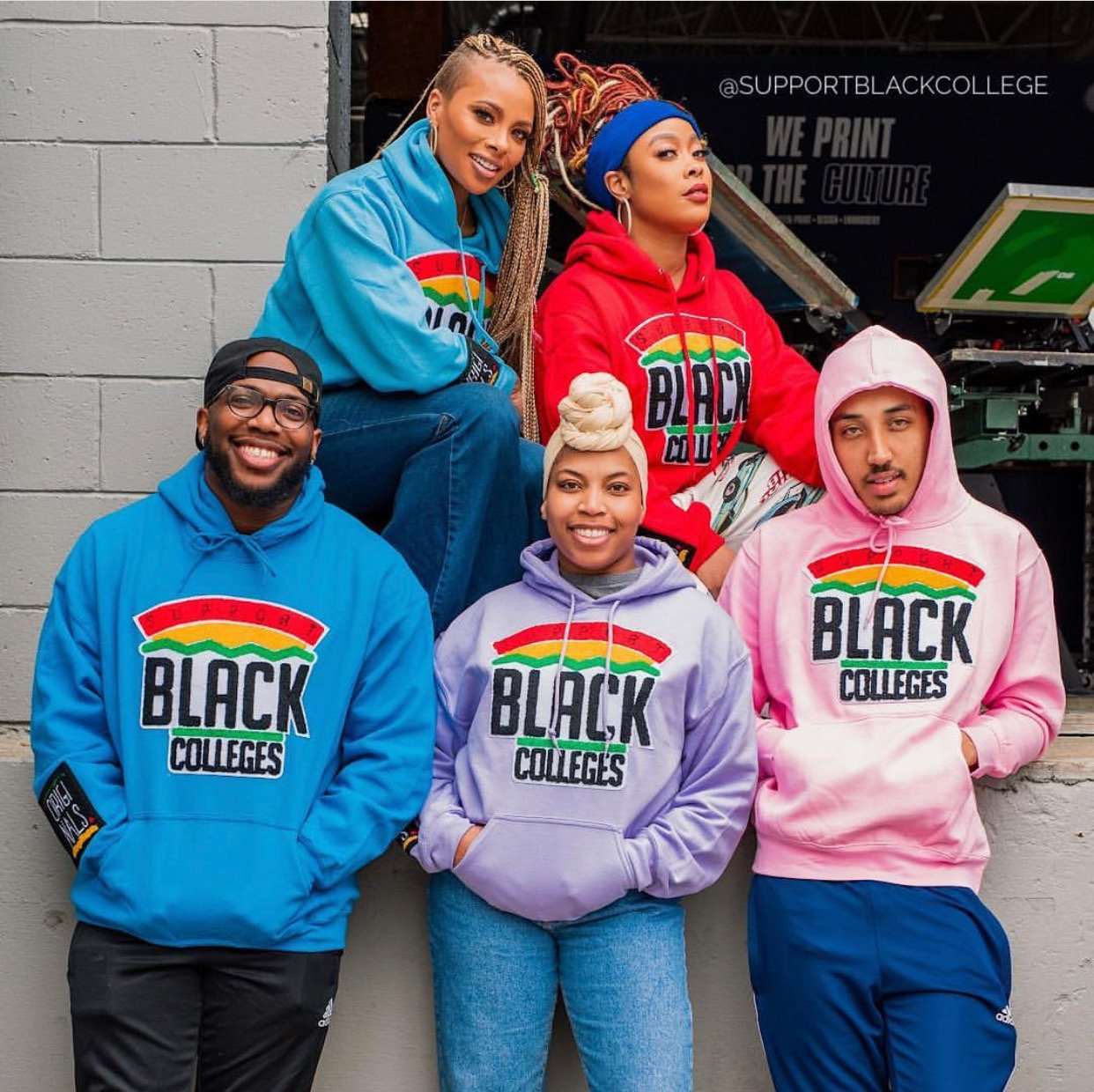 Models in support black college hoodies