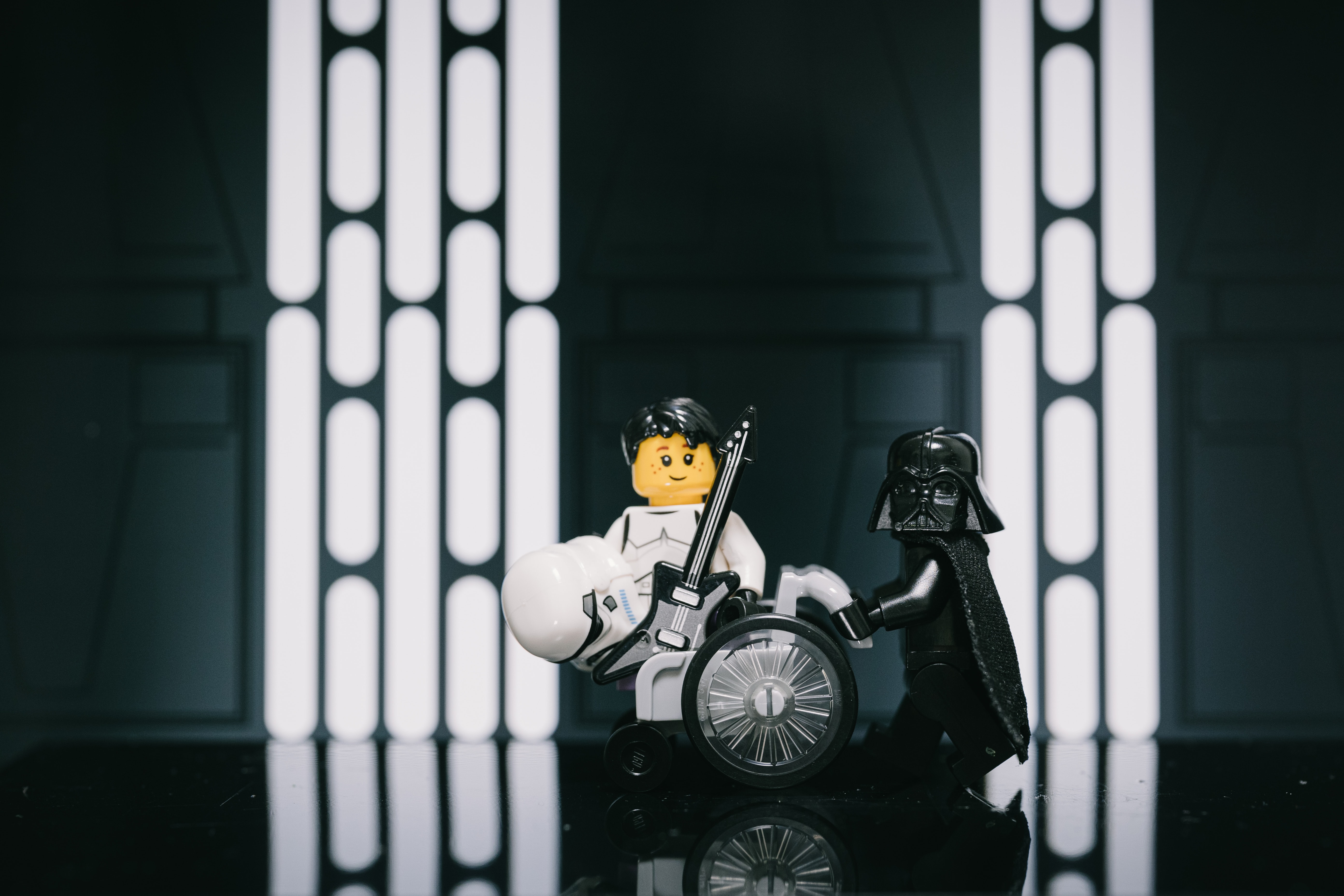 Lego Darth Vader and Han Solo dressed as a storm trooper hang out