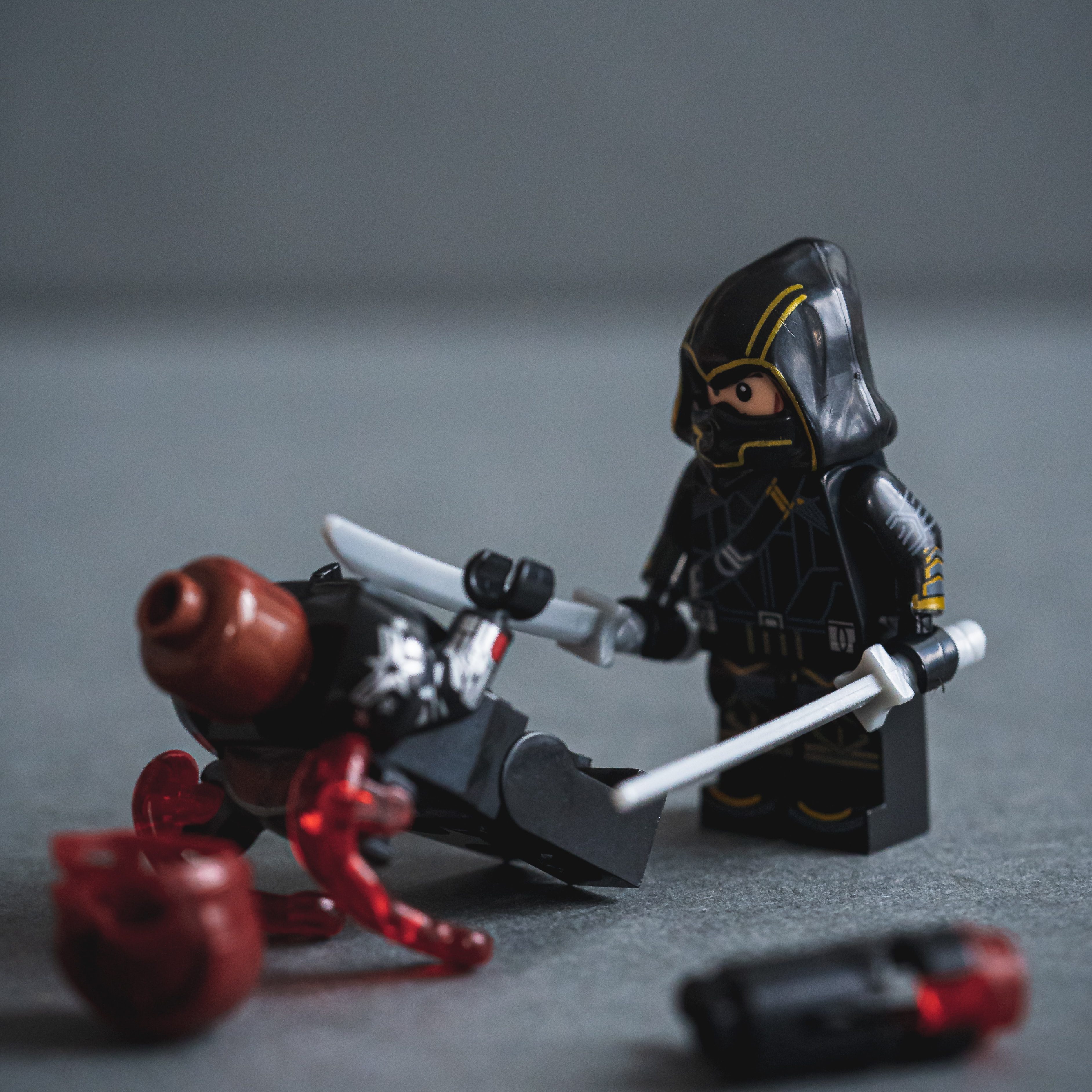Two lego knights battle it out. 
