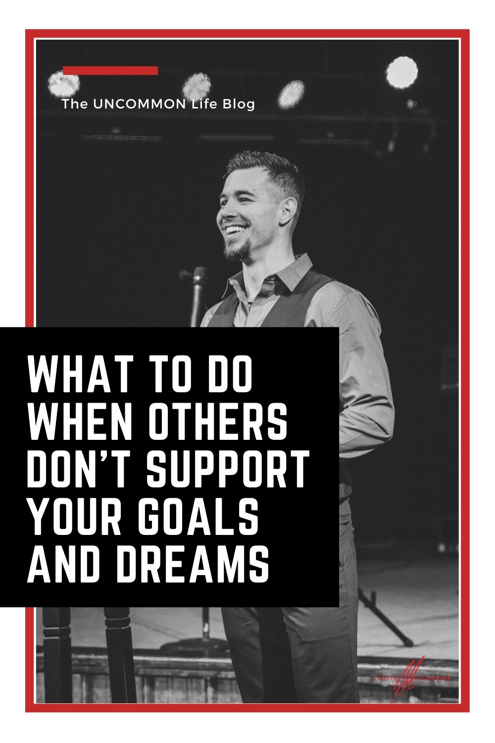Black and white picture of a man in a suit behind the text "What to do when other don't support your goals and dreams"