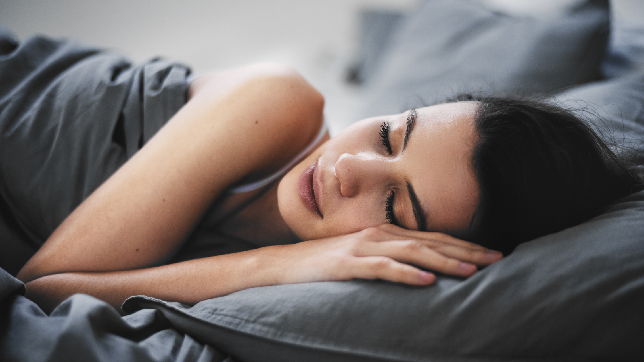 good sleep habits / young woman sleeping