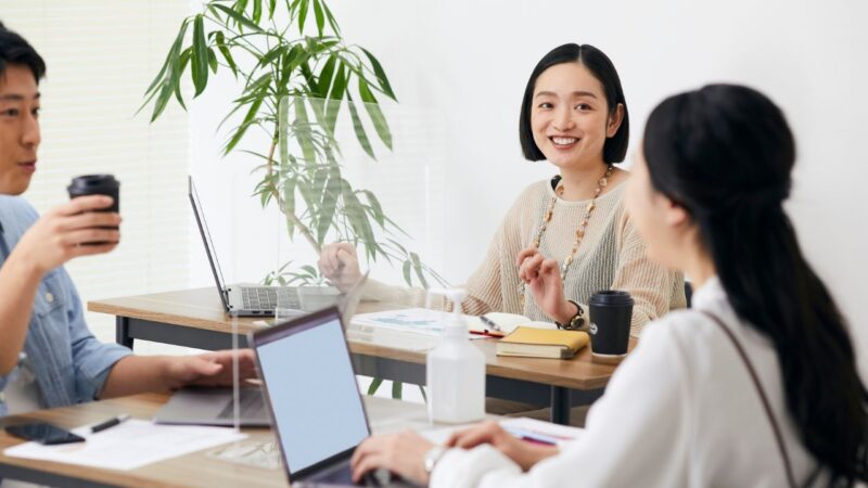 Team working together illustrating what builds lasting success in business