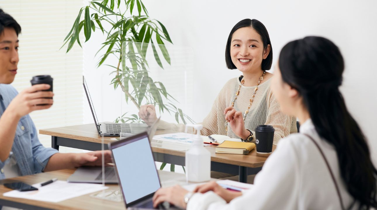 Team working together illustrating what builds lasting success in business