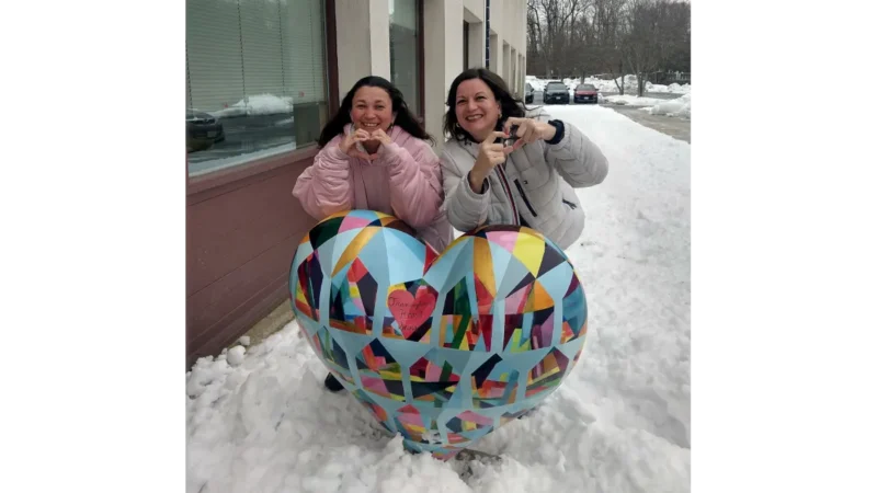After pulling an all-nighter in a gas station parking lot, Ximena (left) and Monica Martinez (right) were all smiles upon arriving at the headquarters of the Framingham Heart Study. (Courtesy of Monica Martinez)